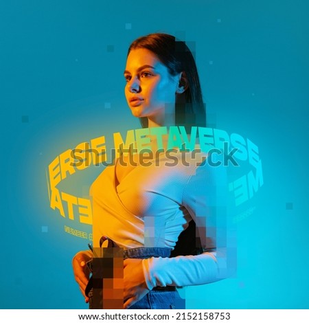 Contemporay artwork. Young beautiful woman with neon lettering around body isolated over blue background in neon light. Concept of digitalization, artificial intelligence, technology era, IT science