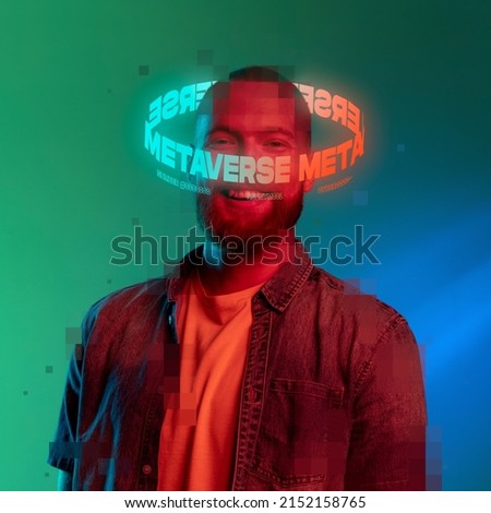Contemporay artwork. Ypung smiling man with neon lettering around pixel head isolated over green background in neon light. Concept of digitalization, artificial intelligence, technology era