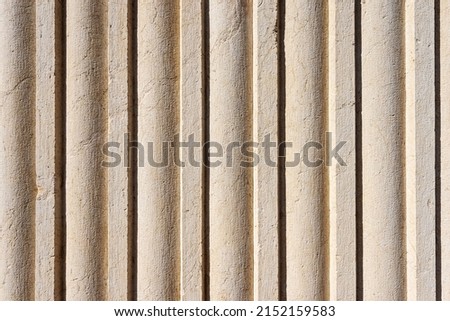 Extreme close-up of a striped Roman marble column, full frame, background, photography. Brescia, Lombardy, Italy, Europe. Royalty-Free Stock Photo #2152159583