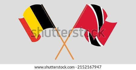 Crossed and waving flags of Belgium and Trinidad and Tobago. Vector illustration
