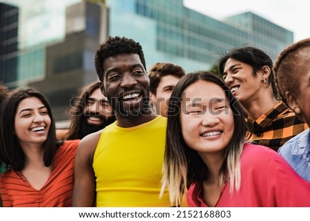 Diverse friends having fun in the city - Concept of multiracial people and friendship Royalty-Free Stock Photo #2152168803