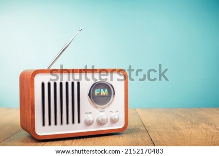 Retro old FM radio front gradient mint blue background. Vintage style filtered photo Royalty-Free Stock Photo #2152170483