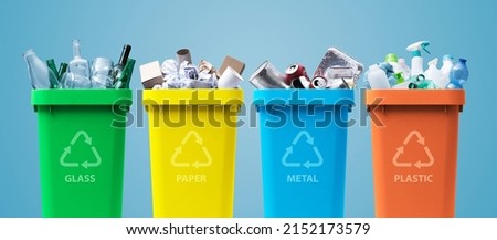 Collection of waste bins full of different types of garbage, recycling and separate waste collection concept Royalty-Free Stock Photo #2152173579