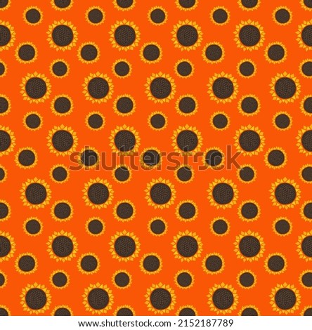 Seamless pattern of the sunflowers
on the orange background