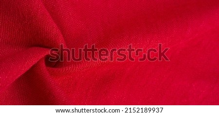 Red jersey. Don't worry, our T-shirt is not the scarlet that Nathaniel Hawthorne wrote about. The drape is incredibly fluid and grippy. This raspberry viscose is for some of their best designs.