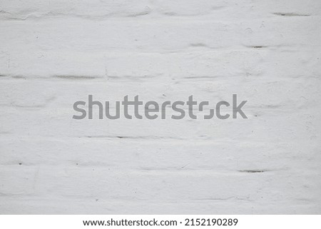 old white shabby brick wall