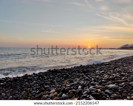 Beautiful sunset on the Black Sea coast in the Adler district of Sochi Royalty-Free Stock Photo #2152206547