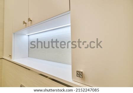 white cabinet for toiletries. Modern stylish marble bathroom with white toiletries cabinet Royalty-Free Stock Photo #2152247085