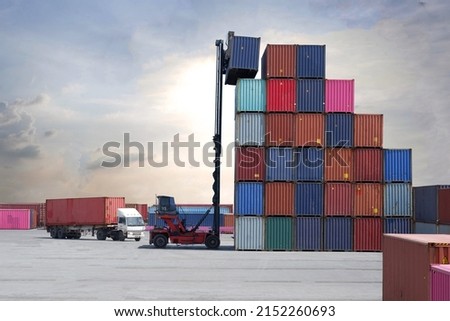 Inland shipping of containers with a container handler Royalty-Free Stock Photo #2152260693