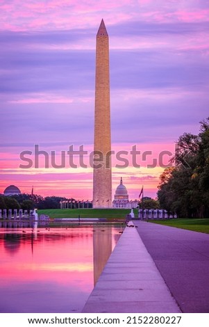 View of Washington Monument and United States Capitol fromLincoln Memorial Reflecting Pool at sunrise in Washington DC, USA. Royalty-Free Stock Photo #2152280227
