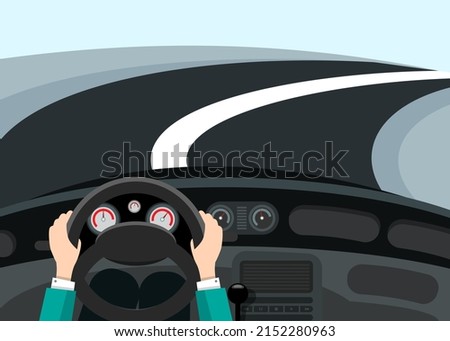 Driving car concept - hands on steering wheel with curved asphalt road on background