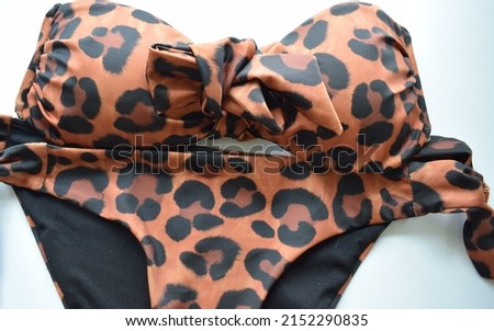 Bikini with leaopard print to wear at the beach during summer time and vacation with fashion sense
