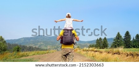 Freedom mountain children hiking trail walking hills. Piggyback ride father child travel mountain kids freedom child on shoulders dad and daughter father walking hiking trip nature kid arms spread out Royalty-Free Stock Photo #2152303663