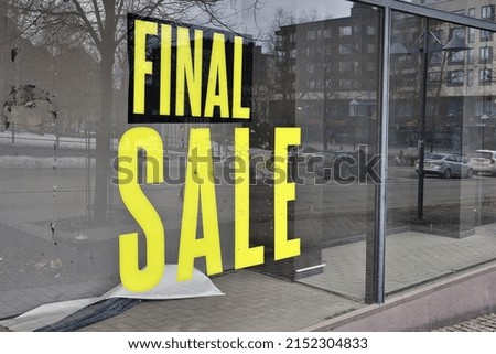 A final sale sign on a closed store window