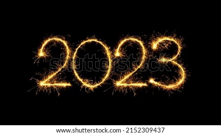 Happy New Year 2023. Sparkling burning numbers Year 2023 isolated on black background. Beautiful Glowing golden overlay element for design holiday greeting card, billboard and Web banner