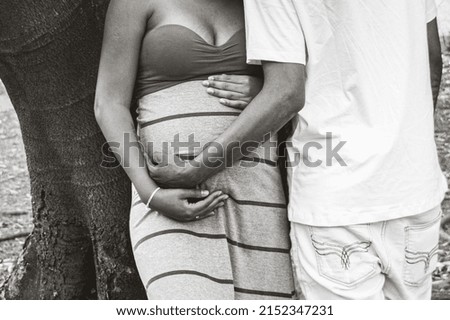 Family photo with pregnant woman