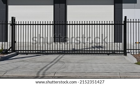 Automatic industrial sliding entrance gate Royalty-Free Stock Photo #2152351427