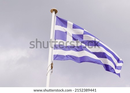 greek greece flag wave over a cloudy sky 