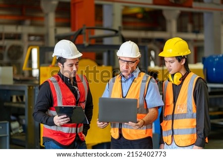 Team of diversity worker inspecting inside the steel manufacturing factory while listening to senior manager advice on improvement of capacity and productivity Royalty-Free Stock Photo #2152402773