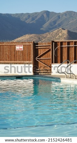 Swimming pool in a motel at Lake Isabella on the Pacific Crest Trail in California, USA. Royalty-Free Stock Photo #2152426481