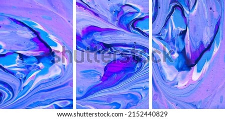 Fluid art painting. Abstract decorative marble texture. Background with liquid acrylic. Mixed paints for poster or wallpaper. Modern art. Psychedelic  colors. White, purple, pink and blue.
