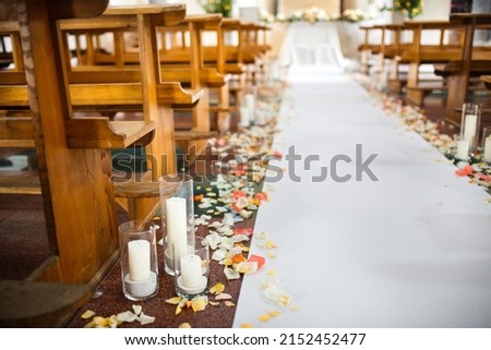 An image of a church after a wedding ceremony. Royalty-Free Stock Photo #2152452477