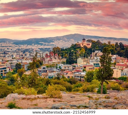 Splendid summer cityscape of Athens, Greece, Europe. Impressive sunset in Athens. Traveling concept background. Royalty-Free Stock Photo #2152456999