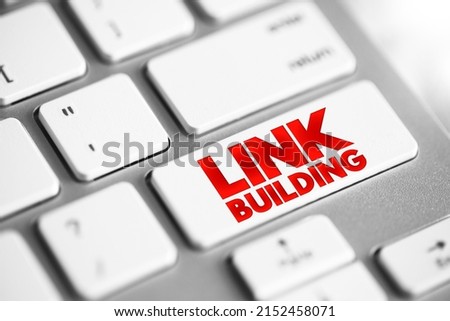 Link building - practice of building one-way hyperlinks to a website with the goal of improving search engine visibility, text button on keyboard Royalty-Free Stock Photo #2152458071