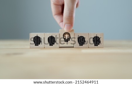 Personal ethics concept. Ethical mindset. Business integrity and moral. Selecting wooden cubes with ethical person. Hiring, recruitment, promoted employee. Company culture and sustainable success. Royalty-Free Stock Photo #2152464911