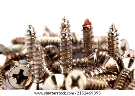 Macro image of construction screws set screws. Abstract industrial background screw macro image, screw background, steel screw, screw macro