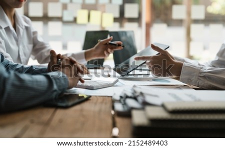 Business people are meeting for analysis data figures to plan business strategies. Business discussing concept Royalty-Free Stock Photo #2152489403