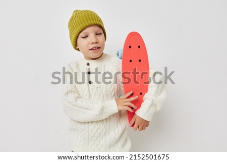 cute girl in hats with a skateboard in their hands Lifestyle unaltered
