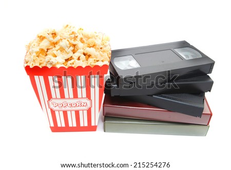 popcorn in box and Video Cassette on white background 