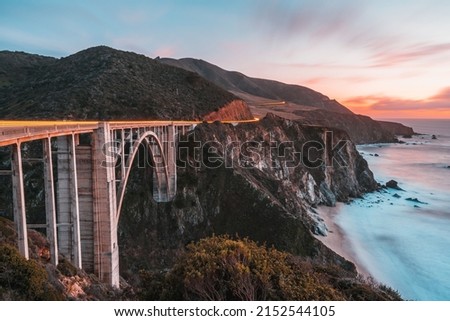 A beautiful shot of a sunset over the Bixby Creek Bridge on the Big Sur coast of California Royalty-Free Stock Photo #2152544105