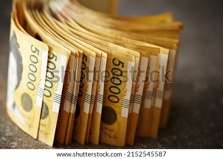 stack of money, Korean banknotes, 50,000 won	 Royalty-Free Stock Photo #2152545587