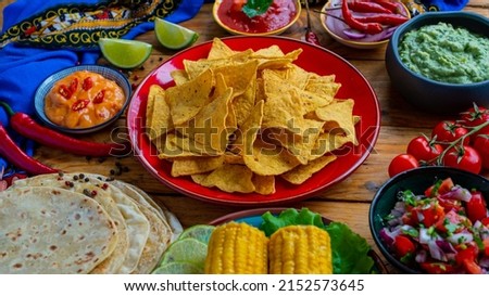 Cinco de mayo food. Traditional mexican corn tortilla chip, Pico de gallo, Nachos, Guacamole, Salsa, Burrito