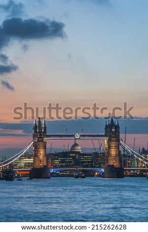 Tower Bridge in London with colorful sunset. 