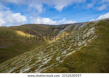Cross Fell is the highest mountain in the Pennine Hills of Northern England and the highest point in England outside the Lake District Royalty-Free Stock Photo #2152630597