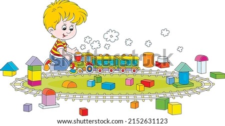 Happy little boy playing with a toy railway train and cubes of different shapes and colors in a playroom, vector cartoon illustration on a white background