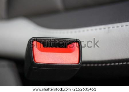 Close up of a seat belt catch in a new vehicle Royalty-Free Stock Photo #2152635451