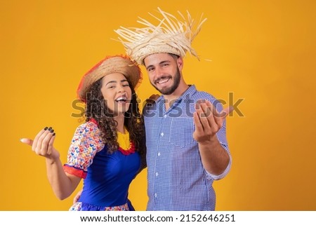 Brazilian couple wearing traditional clothes for Festa Junina - June festival Royalty-Free Stock Photo #2152646251