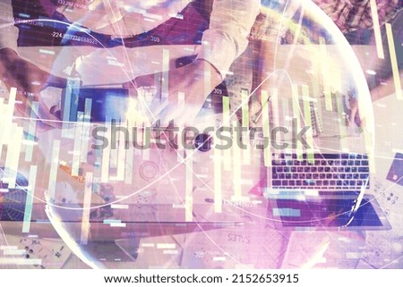 Double exposure of man and woman working together and business theme hologram drawing. Computer background. Top View.