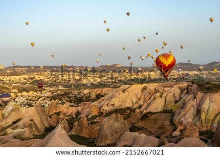 Balloons on the sky in Cappadocia in the morning. Colorful hot air balloons photography in Goreme village.