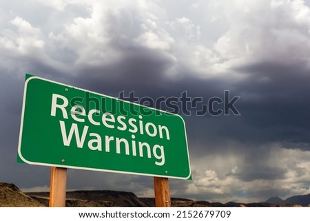 Recession Warning Green Road Sign Over Dramatic Clouds and Sky. Royalty-Free Stock Photo #2152679709