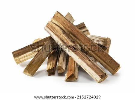 Stacks of firewood placed against a white background Royalty-Free Stock Photo #2152724029
