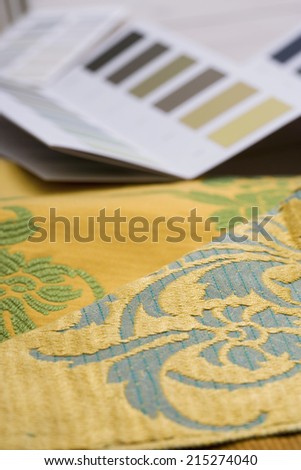 Colour swatches and wallpaper design samples, close-up (still life, differential focus)