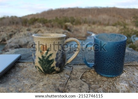 Coffee Mugs Joined Handles On Rocks Nature Park