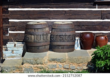 Beer mills and beer kegs in the cottage