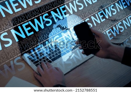 Close up of businessman hand using laptop and mobile phone on blurry blue breaking news pattern background. Headline, communication and global world concept. Double exposure