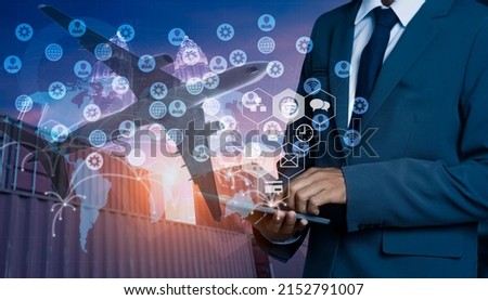 Double exposure businessman using tablet and digital technology finance interfaces icon with container cargo ship background, Business logistic and transport concept.